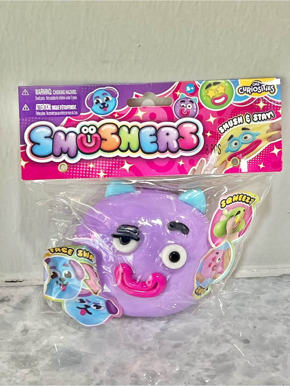 SOLD! Smushers Purple Face Squishy Toy